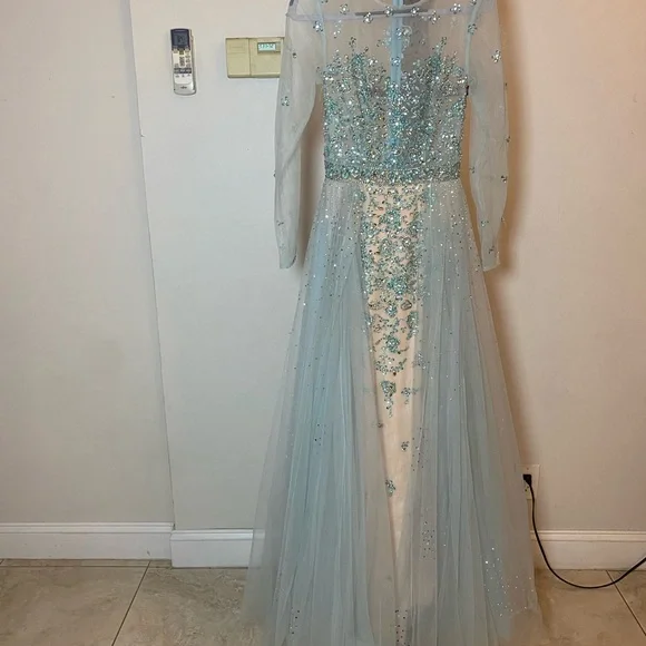 Jovani | Dresses | Jovani Light Blue Long Sleeve Gown | Poshmark Jovani | Dresses | Jovani Light Blue Long Sleeve Gown | Poshmark